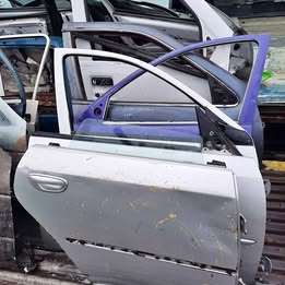 Chapa de puerta subaru legacy año:1995