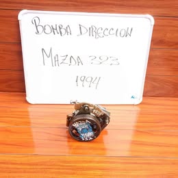 Bomba de dirección mazda 323 año:1994