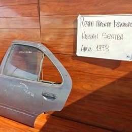 Chapa de puerta Nissan sentra año:2000