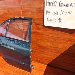 Puerta pelada hyundai accent año:1999