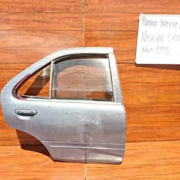 Puerta pelada Nissan serntra año:1998