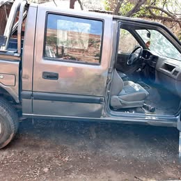 Vidrio de puerta chevrolet luv 2.3 año:1995