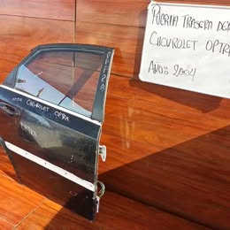 Vidrio de puerta chevrolet optra año:2004