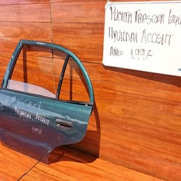 Vidrio de puerta hyundai accent año:1997