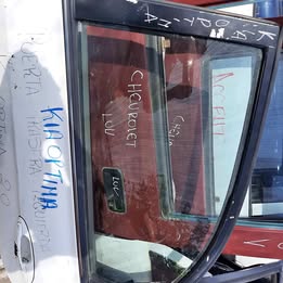 Vidrio de puerta kia óptima año:2004
