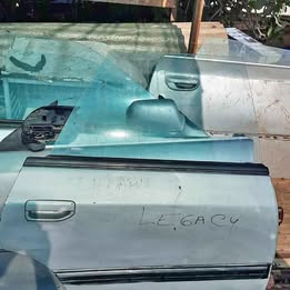 Vidrio puerta subaru legacy año:1997