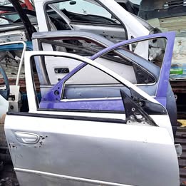 Chapa de puerta subaru legacy año:1995