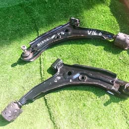 Dos bandejas Nissan v-16 twimcan año:2004