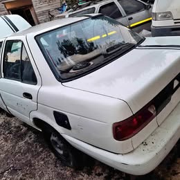 Parachoque trasero Nissan v-16 twimcan año:2004