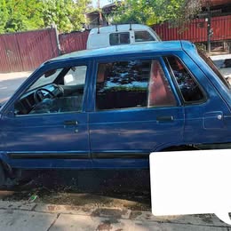 Puerta pelada chófer suzuki maruti año:2000