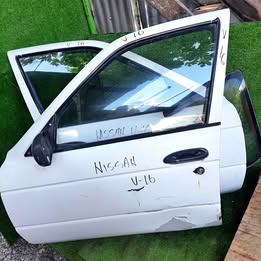 Puerta pelada Nissan v-16 twimcan año:2004