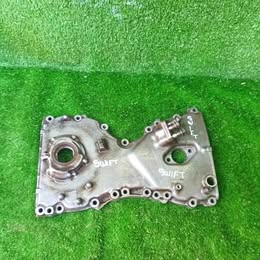 Tapa de distribución suzuki Swift año:2010