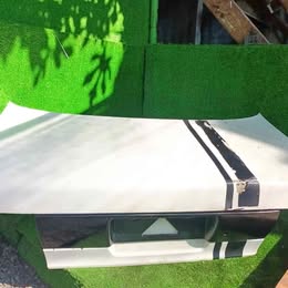 Tapa de maleta Nissan v-16 twimcan año:2000