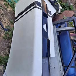 Tapa maleta Nissan v-16 twimcan año:2000