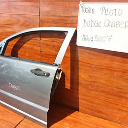 Chapa de puerta conductor dodge caliber automática año:2009