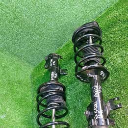 Dos marcpherson traseros Nissan v-16 año:2004