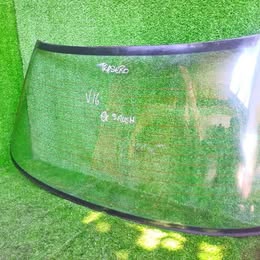 Parabrisa trasero Nissan v-16 twimcan año:2003