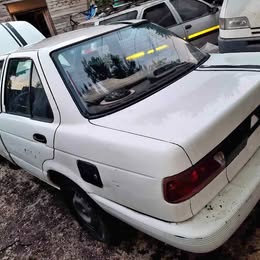 Parachoque trasero Nissan v-16 twimcan año:2000