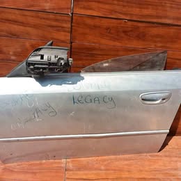 Puerta pelada subaru legacy año:2000