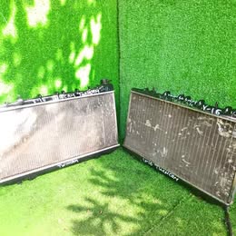 Radiador Nissan v-16 ex-salon año:2004