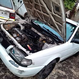 Tapabarro Nissan v-16 twimcan año:2000