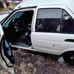 Vidrio puerta trasera Nissan v-16 twimcan año:2000