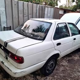 Vidrio trasero Nissan v-16 twimcan año:2000