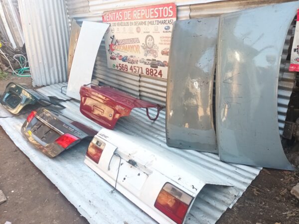 tapa maletera hyunda accent 2006