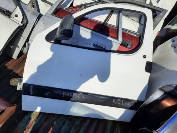 puerta conductor peugeot parther 2009
