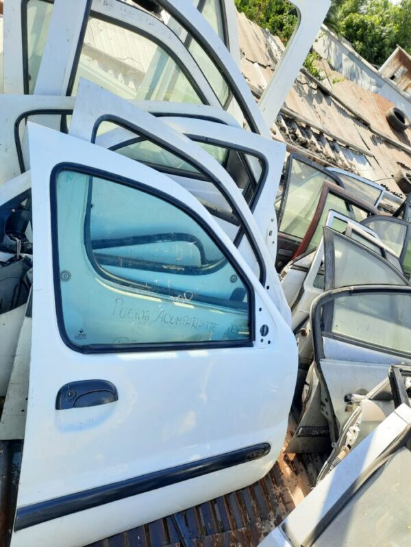vidrio de puerta copiloto peugeot parther 2009