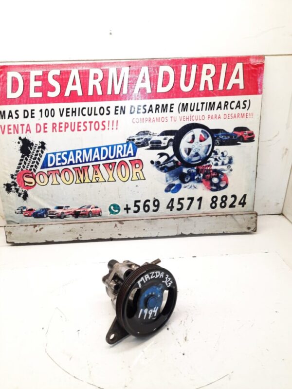 bomba de dirección mazda 323 año:1994