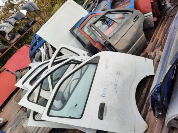 vidrio copiloto kia besa 2.7 año:2000