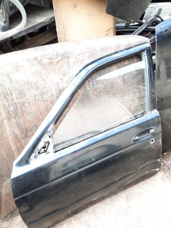vidrio conductor Nissan v-16 twimcan año:2005