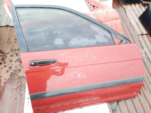 vidrio puerta copiloto Toyota tercel año:1995