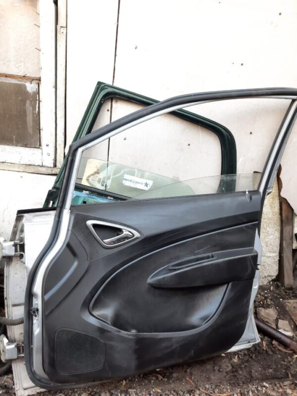 tapiz puerta copiloto chevrolet sail 1.4 año:2015