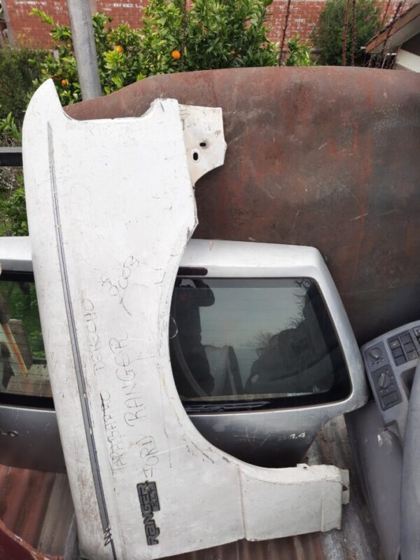 tapa- barro ford Ranger año:1997