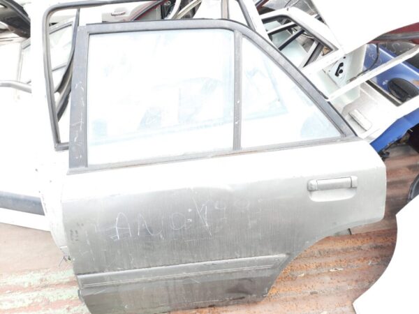 vidrio de puertas mazda 323 año:1994