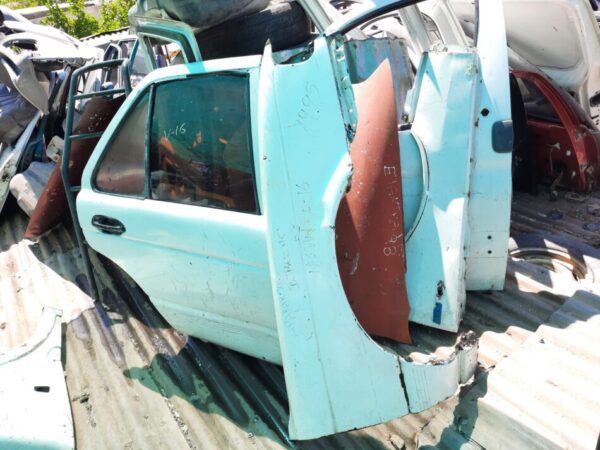 tapabarro Nissan v-16 twimcan año:2004